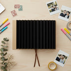 Arenzza Memory Keeper accordion scrapbook album for kids, featuring colorful pages and playful design for storing memories and crafts.
