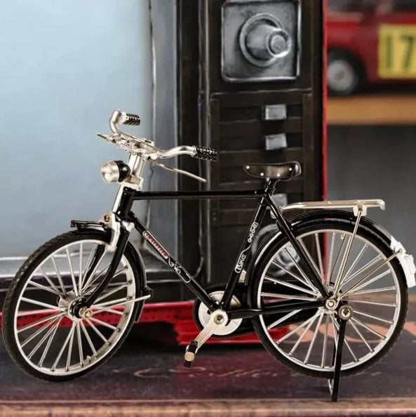 A detailed Arenzza DIY bicycle model toy for kids and gifts, showing assembled miniature bicycle with intricate parts.