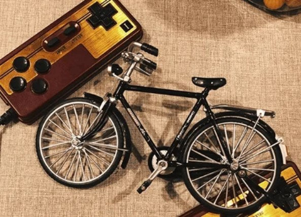 Aarenza DIY bicycle model toy for kids, featuring a detailed miniature bicycle kit suitable for creative building and gifting.