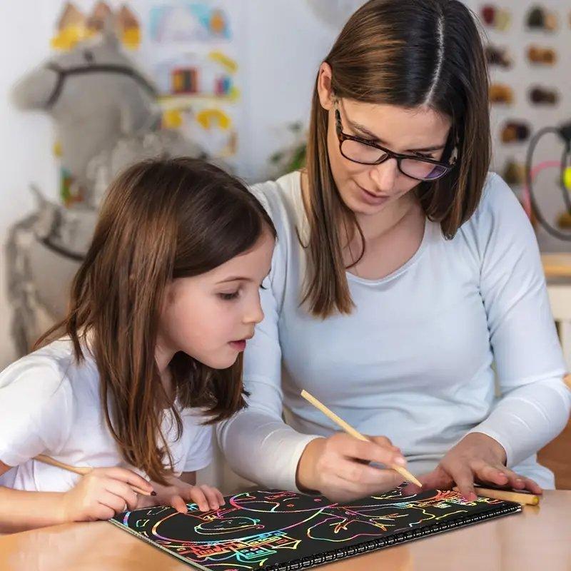 Colorful Rainbow Magic Scratch Paper by Arenzza, kids' toy with vibrant, scratch-off surface for creative art and craft projects.