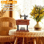 Arenzza wood mini sewing machine music box toy for kids, featuring a detailed miniature sewing machine design and musical movement.