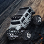 Arenzza mini RC off-road truck with lights, toy vehicle designed for kids, featuring rugged tires and bright LED lights.