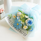Handmade crochet flower bouquet toy by Arenzza, featuring delicate and colorful crocheted flowers arranged in a charming bouquet.