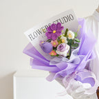 Handmade crochet flower bouquet by Arenzza, delicate and colorful toy gift with intricate crochet flowers arranged in a charming bouquet.