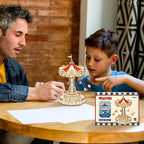 Arenzza DIY Wooden Puzzle Carousel Music Box, a colorful handcrafted toy with intricate wooden pieces and a rotating carousel design.