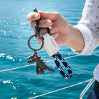 Arenzza aluminum alloy dinosaur charm paired with a hand-woven bracelet, colorful toy accessory for kids and gifts.