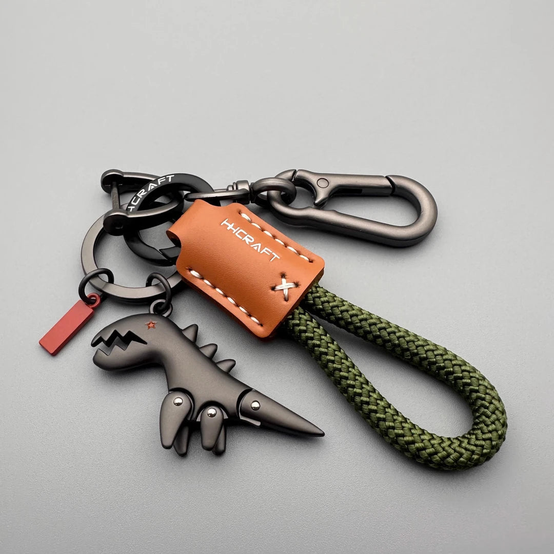Arenzza aluminum alloy dinosaur charm paired with a woven bracelet, perfect as a kids' toy or gift accessory.