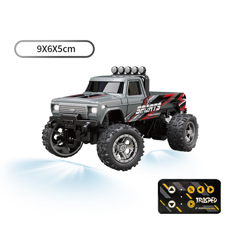 Arenzza OEIN Mini RC Monster Truck toy with bright red and black design, ready for outdoor play and off-road adventures.