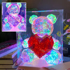 Colorful glowing bear toy from Arenzza, perfect for kids and gifts, with vibrant lights and soft plush fabric.