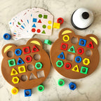Arenzza Christmas Shape Matching Game for kids, featuring colorful cards with various holiday-themed shapes for fun learning.