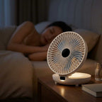 Aarenza EasyBreeze™ portable cooling unit with integrated night light, shown in a modern living room setting with four people relaxing nearby.