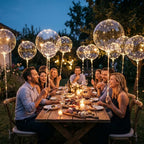 A group of people celebrating with colorful LED decorative party balloons at a lively outdoor event.