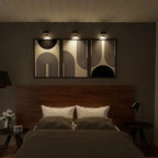 Arenzza wireless magnetic wall lamp with 360° rotating light, showcasing a sleek modern design mounted on a wall.