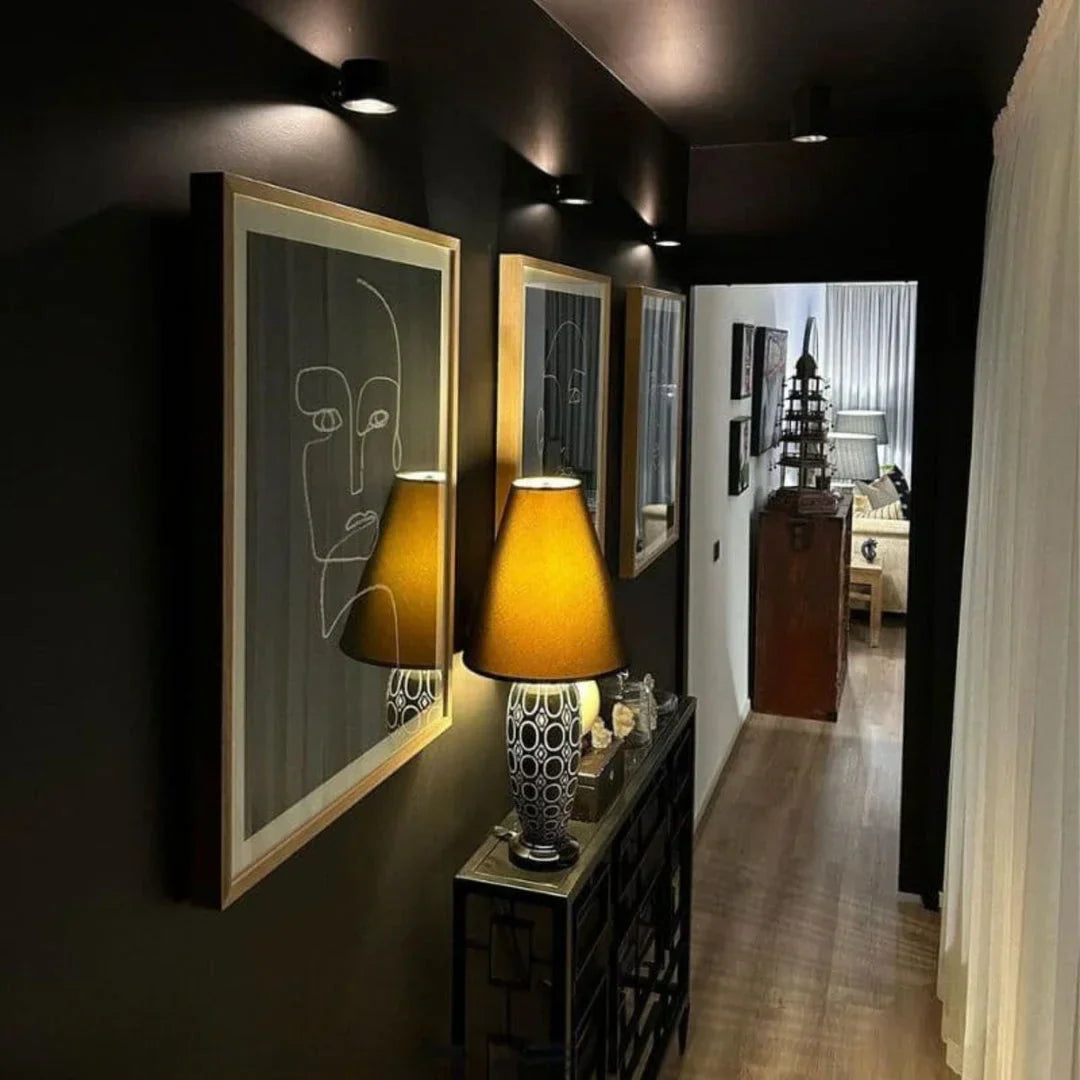 Arenzza wireless magnetic wall lamp with 360° rotating light, modern design, mounted on a wall with a sleek, minimalist look.
