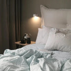 Arenzza wireless magnetic wall lamp with 360° rotating light, sleek modern design, ideal for versatile room lighting.