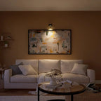 Arenzza Wireless Magnetic Wall Lamp with 360° rotating light, sleek modern design, mounted on wall with adjustable angles.