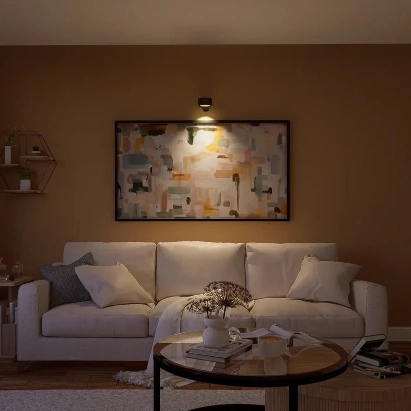Arenzza Wireless Magnetic Wall Lamp with 360° rotating light, sleek modern design, mounted on wall with adjustable angles.