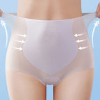 A pair of high waisted seamless elastic hip lifting panties by Arenzza, shown on a model highlighting the snug fit and smooth fabric.