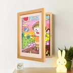 Aarenza kids art display frame showing colorful children's drawings mounted on a wall for easy viewing and decoration.