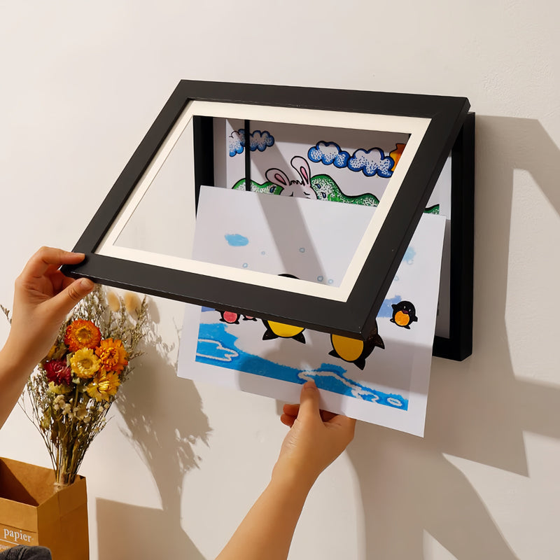 Arenzza kids art display frame showcasing colorful children's drawings arranged as stylish wall art.