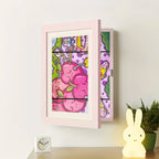 Arenzza Kids Art Display Frame showcasing colorful children's drawings in a sleek wall-mounted frame.