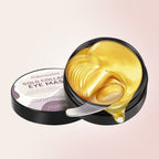 Aurenza Haven gold under eye patches applied under eyes, showcasing their luxurious, revitalizing design for skincare.