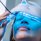 Wireless face mask for light therapy by Aurenza Shop, showing the sleek, adjustable design and LED light panels for skin treatment.