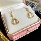 WIMAID™ Lymph Flow Magnetogen Earrings by Aurenza Shop featuring silver-tone earrings with magnetic and lymphatic stimulation elements