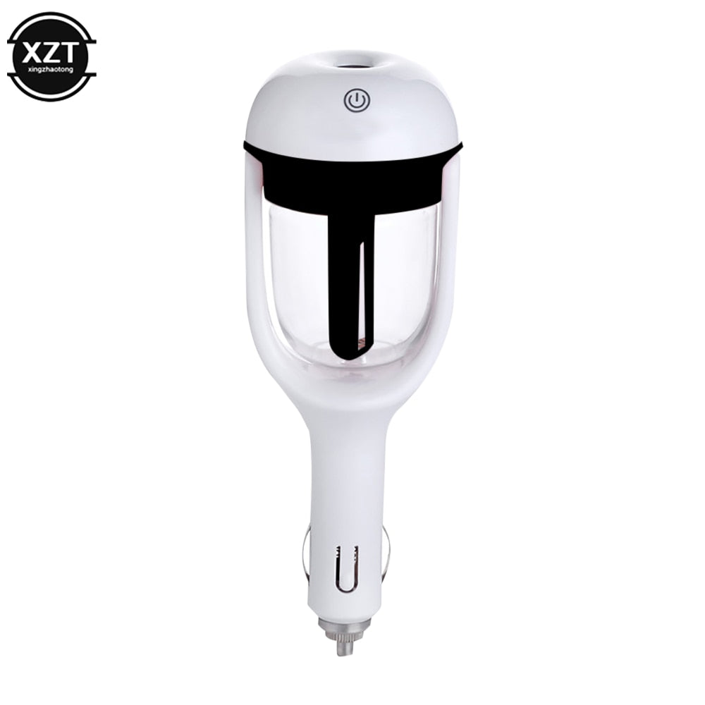Aurenza Shop mini car humidifier in white with a compact design, emitting a gentle mist inside a vehicle.