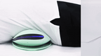 Aurenza ComfortEase lumbar massager with heat function showing a close-up of the device with adjustable straps and heating elements.