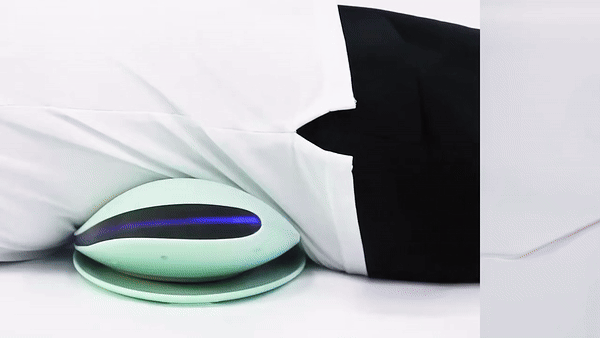 Aurenza ComfortEase lumbar massager with heat function showing a close-up of the device with adjustable straps and heating elements.