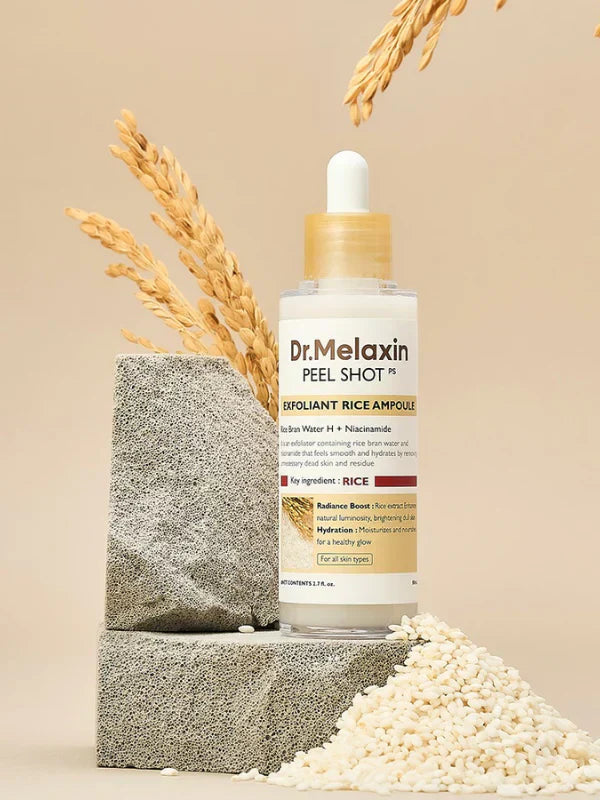 Aurenza Dr.Melaxin Peel Shot Glow Rice Ampoule Duo in black and white bottles, featuring skincare serum bottles with product labels.