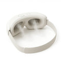 Aurenza Shop Kahuna Steam Therapy Goggles resting on a white surface, showing sleek design and adjustable strap for facial steam therapy.