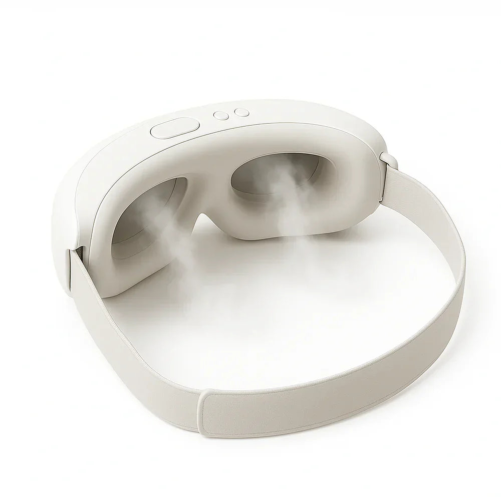 Aurenza Shop Kahuna Steam Therapy Goggles resting on a white surface, showing sleek design and adjustable strap for facial steam therapy.