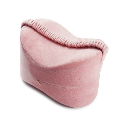 Aurenza Shop Align & Ease Leg Pillow shown on a bed, designed for comfort and proper leg support during sleep.
