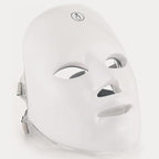 Aurenza Shop Kahuna Red Therapy Facial Mask massager with red LED lights and ergonomic handle for skincare treatment.