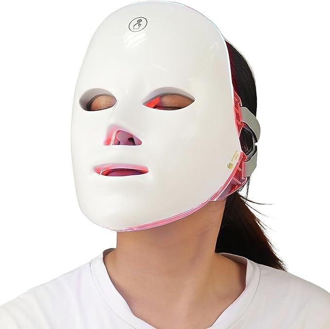 Aurenza Shop Kahuna Red Therapy Facial Mask massager with red LED lights and ergonomic handle for facial skincare treatments.