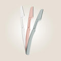 Aurenza Shop eyebrow and face razor with a sleek handle and sharp blades for precise hair removal.