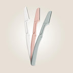 Aurenza Shop eyebrow and face razor with a sleek handle and sharp blades for precise hair removal.