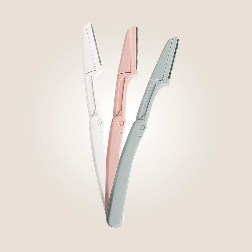 Aurenza Shop eyebrow and face razor with a sleek handle and sharp blades for precise hair removal.