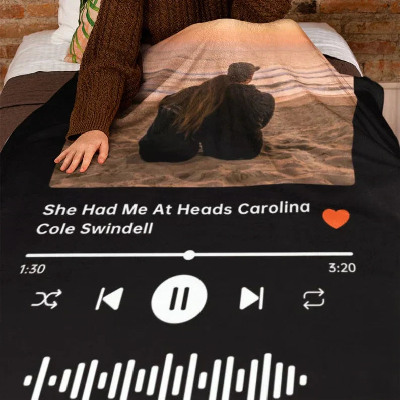 Custom music and photo blanket by Aurenza Shop featuring personalized designs and vibrant fabric, perfect for cozy decor.