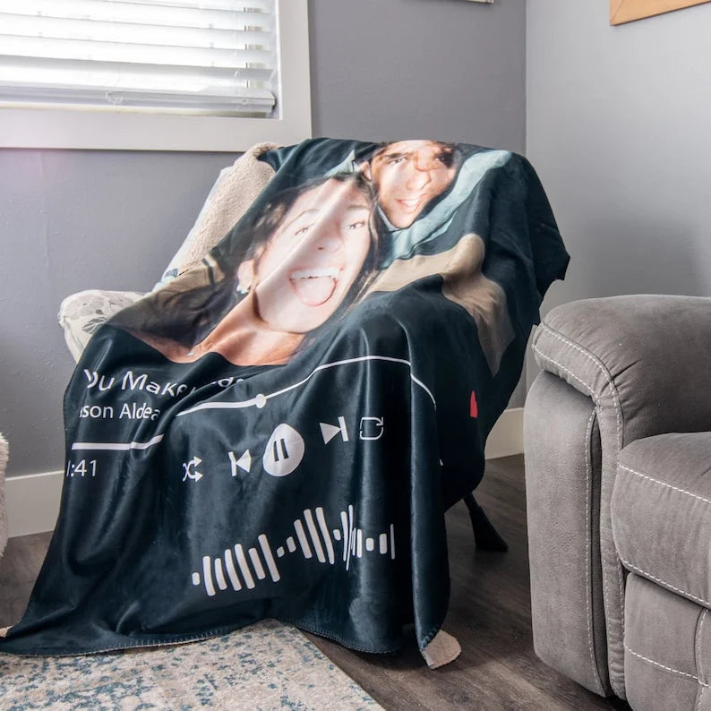 Custom music and photo blanket by Aurenza Shop featuring a personalized design with musical notes and photos on soft fabric.