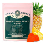 Serenzza Vital Source Feminine Balance Gummies in Hawaiian Pineapple flavor, showing the colorful gummy bottles and fresh fruit.