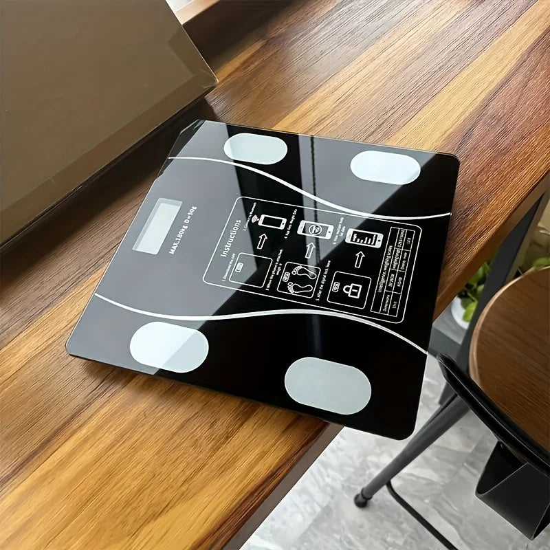 Serenzza smart digital scale with LED display showing weight up to 400 lbs on a bathroom floor.